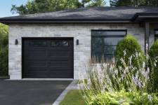 You like this look? This garage door is a Standard+ Shaker-Flat XL, 9' x 8', Black, Clear windows.